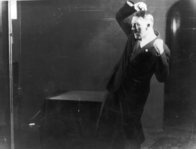 Adolf Hitler Posing to a Recording of His Own Speeches, 1925 (7)